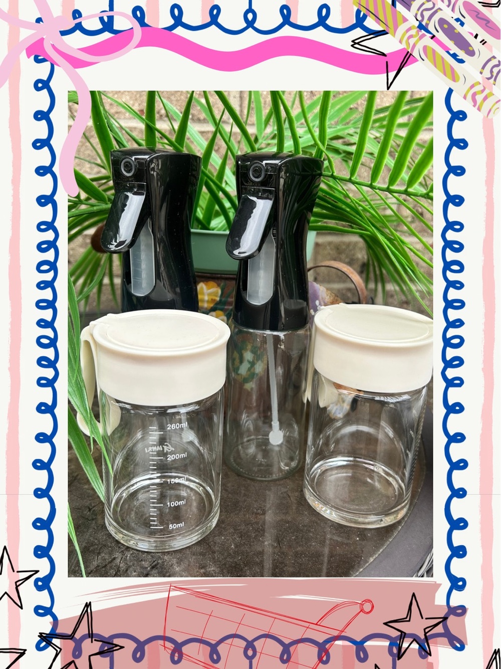 Set of Clear and Black Spray Bottles
